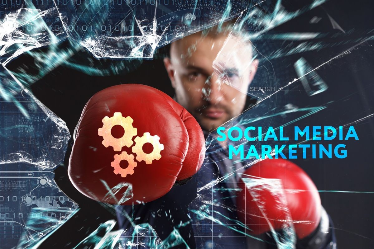 boxer breaking glass with social media marketing